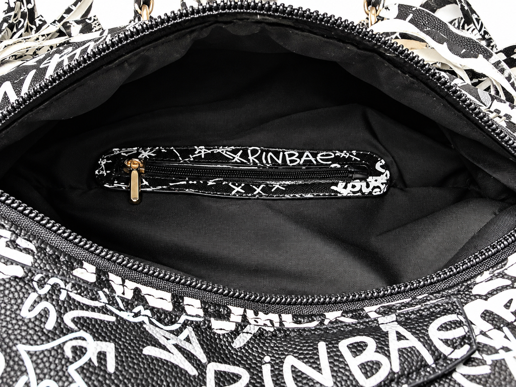 GRAFFITTI COLORED BLACK AND WHITE BACKPACK CROSSBODY BAG PURSE